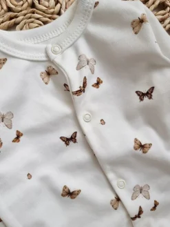Bawełniany pajac niemowlęcy ze stópkami boho motyle (Kopia)