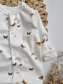 Bawełniany pajac niemowlęcy ze stópkami boho motyle (Kopia)