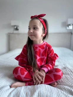 Bluza dla dziewczynki z falbankami serca na różu