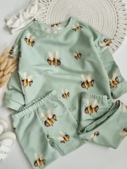Bluza dla dziewczynki z falbankami pszczółki na zieleni