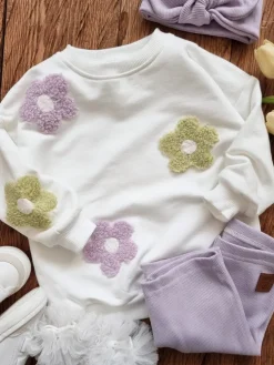 Bluza dziecięca z kolorowymi kwiatuszkami