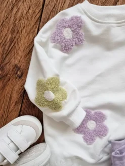 Bluza dziecięca z kolorowymi kwiatuszkami