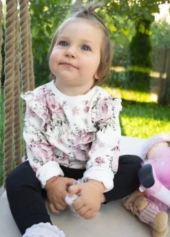 Bluza w kwiaty z falbanką
