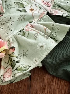 Bluza z baskinką róże na pistacji