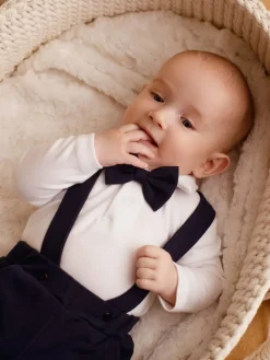 Elegancki komplet dla chłopca body polo + mucha + spodnie z szelkami