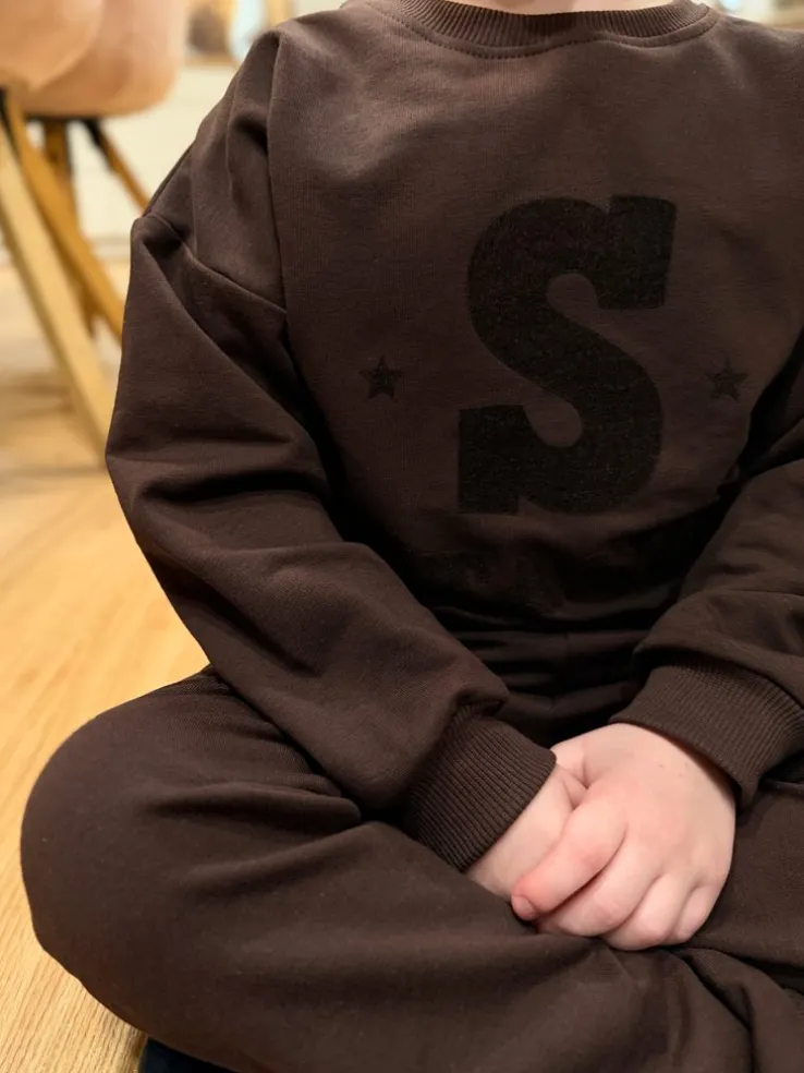 Komplet dla dziecka inicjał z gwiazdkami (bluza + spodnie)