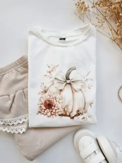 Koszulka z falbankami przy rękawach boho dynia z kokardą