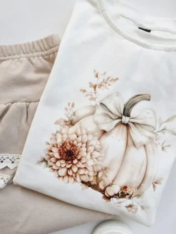 Koszulka z falbankami przy rękawach boho dynia z kokardą