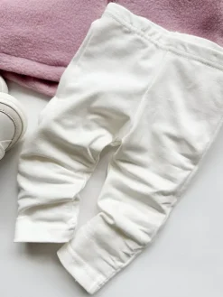 Legginsy ecru rozm 68