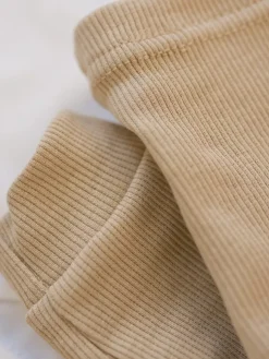 Legginsy niemowlęce prążkowane kremowe