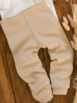 Legginsy niemowlęce prążkowane kremowe