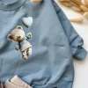 Niebieska bluza dziecięca misio z balonikiem rozmiar 74