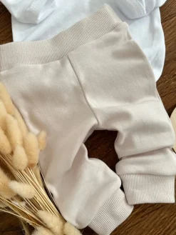 Niemowlęce spodnie bawełniane jasny beż