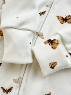 Pajacyk niemowlęcy na suwak ze stópkami boho motyle
