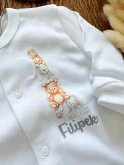 Pajacyk niemowlęcy ze stópkami z nadrukiem króliczków małe cudo
