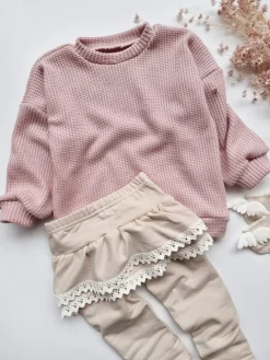 Sweter dziecięcy pudrowy róż