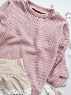 Sweter dziecięcy pudrowy róż
